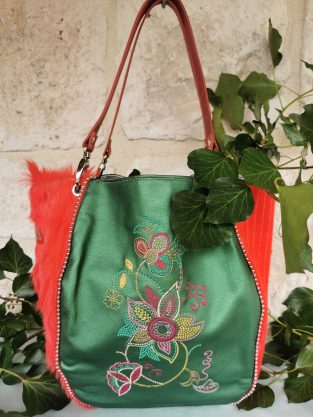 Sac baluchon simili et fausse fourrure...